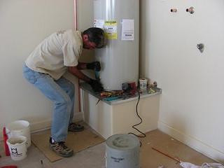 Peter is installing a brand new water heater