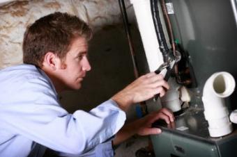 Ralph is repairing a broken water heater